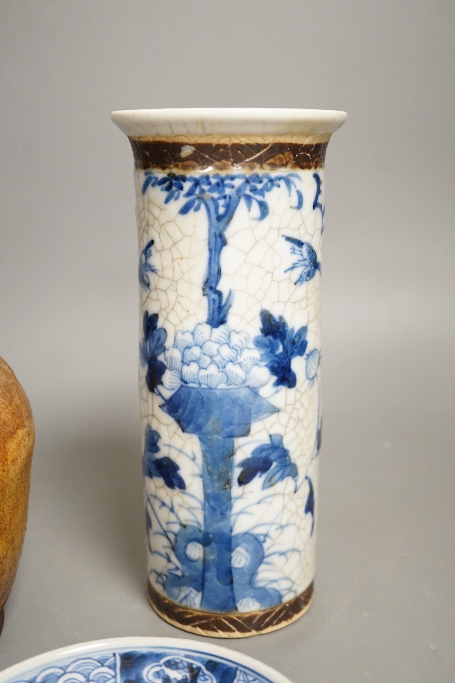 A Chinese crackle glaze blue and white sleeve vase, 20cm high, similar dish and pottery vessel